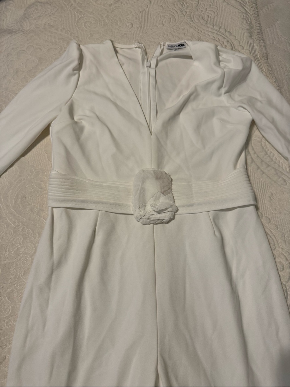 Fashion Nova White Long-Sleeve V-Neck Jumpsuit with Waist Rosette—Never worn